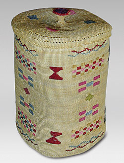 Aleutian Lidded Basket, circa 1900-1920. Rye grass and silk. H. 3-1/2 in. (to the top of the knob), Diam. 2-1/4 in. Courtesy of Marcy Burns American Indian Arts. Sold for approximately $6,000.