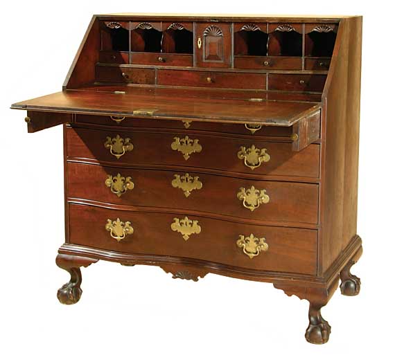 An exceptional Chippendale 'ox-bow' desk