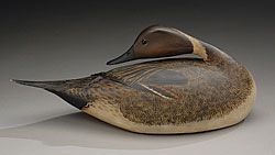 Preening Pintail Drake Decoy. Carved and painted wood, ca. 1915. A. Elmer Crowell (1862-1952), East Harwich, Ma. Sold for a record-setting $1.13 million Courtesy Stephen O'Brien, Jr. Fine Arts, Boston, Ma.