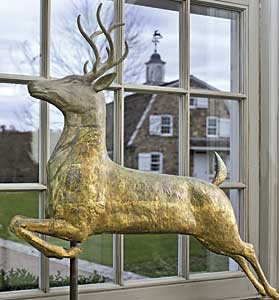 The leaping stag weathervane by J. W. Fiske of New York mimics the stag vane on the cupola of the guest barn. The barn was designed to reproduce a New Jersey stone barn with Dutch gambrel roof.