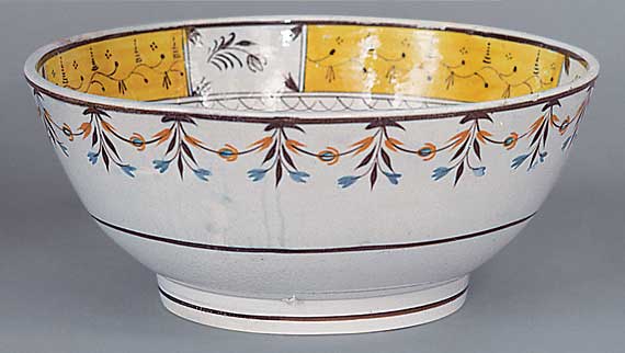Colorful English Prattware bowl decorated both inside and outside