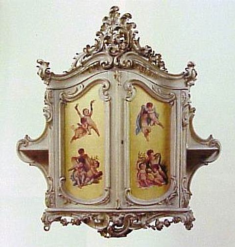A German Gilt Heightened Hanging Cabinet