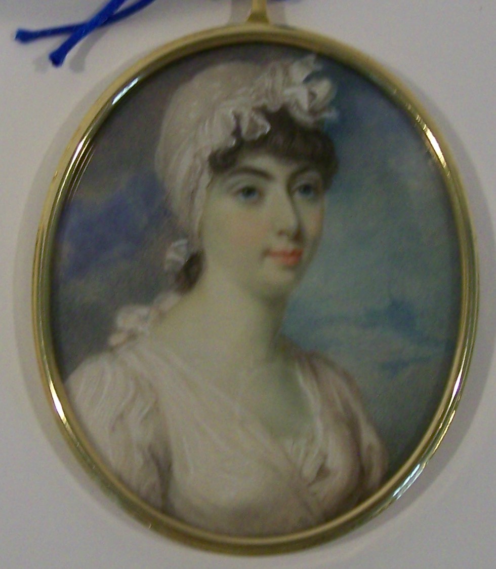 Portrait of a Pretty Young Woman with Dark Hair and Blue Eyes