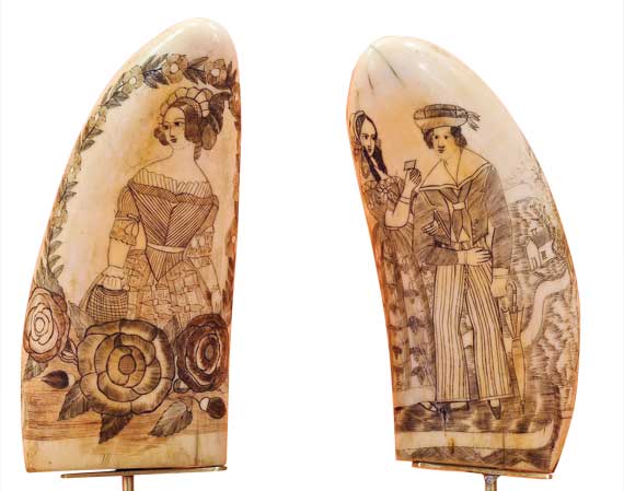 Outstanding pair of scrimshaw polychrome whale's teeth