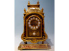 A Boulle clock with stand