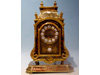 A Boulle clock with stand
