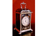 An English Edwardian tortoiseshell & silver clock