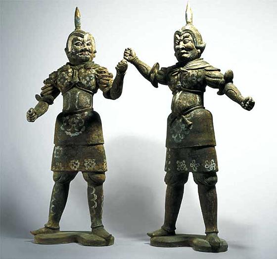 Pair of Dark Pottery Figures of Guardians