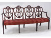 Hepplewhite Carved Mahogany Four Chair-back Settee
