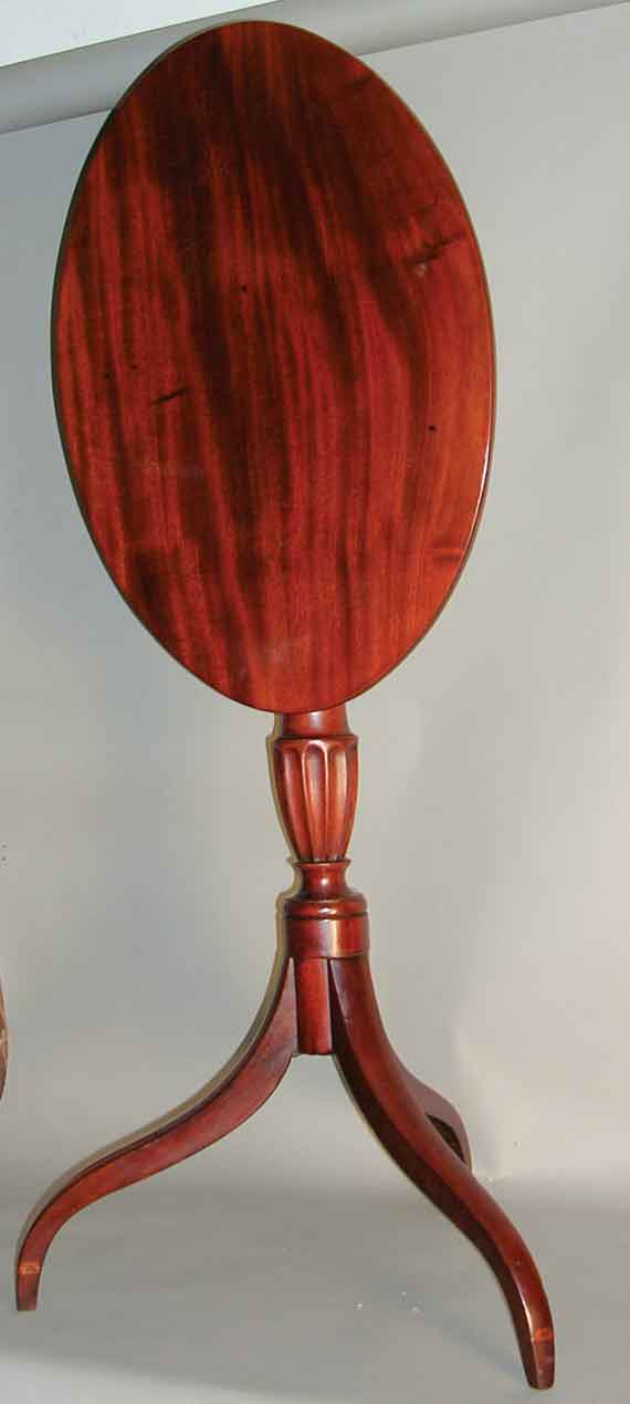 A Very Fine Mahogany Oval Tilt-Top Candlestand