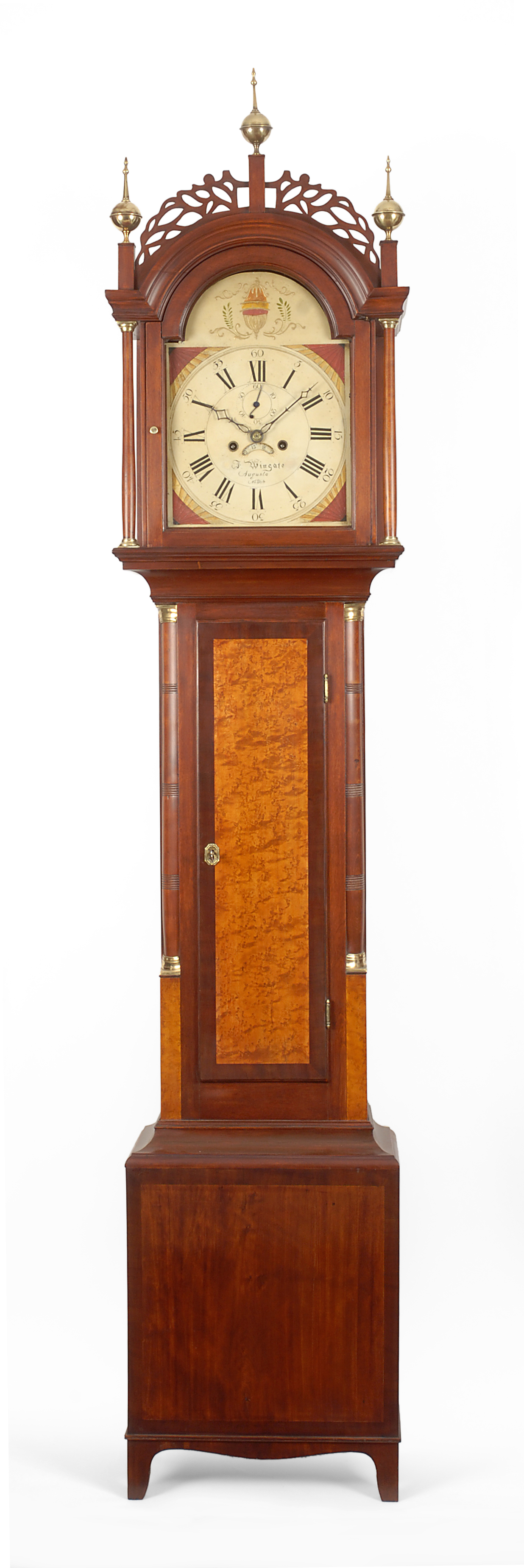 An attractive bird's-eye inlaid Hepplewhite tall case clock by Frederick Wingate, Augusta, Maine, circa 1815.