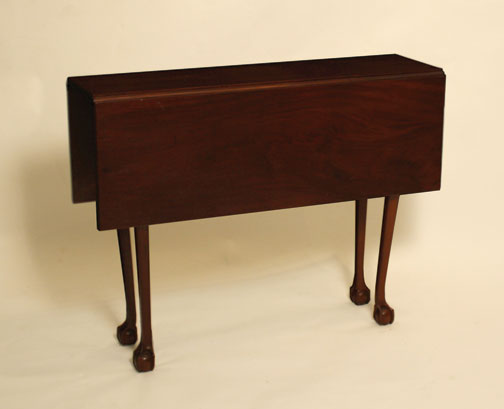 DIMINUTIVE CHIPPENDALE CARVED MAHOGANY DROP-LEAF TABLE