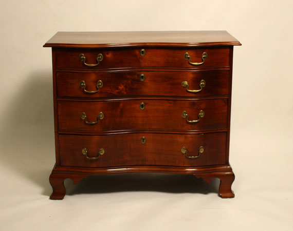 MASSACHUSETTS CHIPPENDALE MAHOGANY SERPENTINE FRONT FOUR-DRAWER CHEST