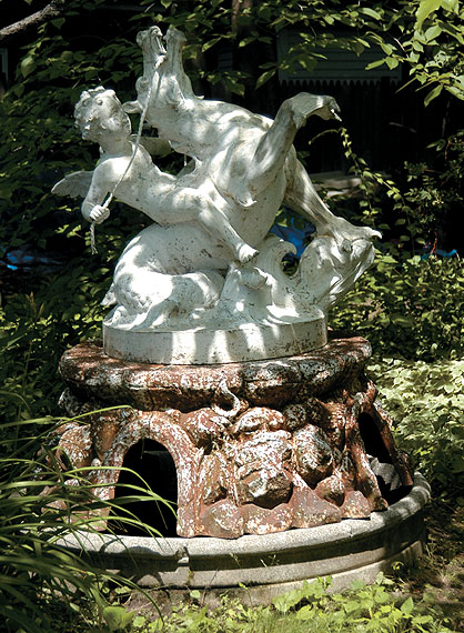 A Fountain of a Putto Astride a Hippocampus